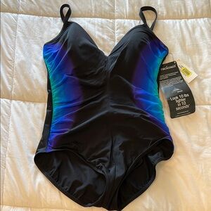 Women’s Black Miraclesuit Swimsuit with Blue, Purple, Turquoise accent.